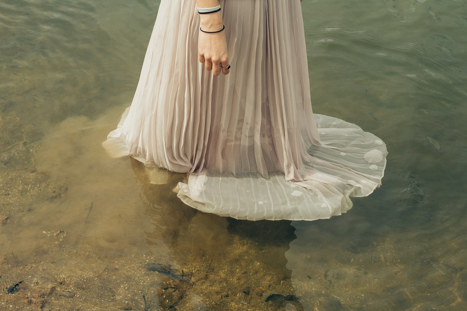 The Lady of the Lake resided in the lost Isle of Avalon. Avalonian Priestess in the water.