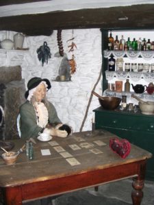 A cunningwoman exhibit at the Witchcraft Museum of Cornwall